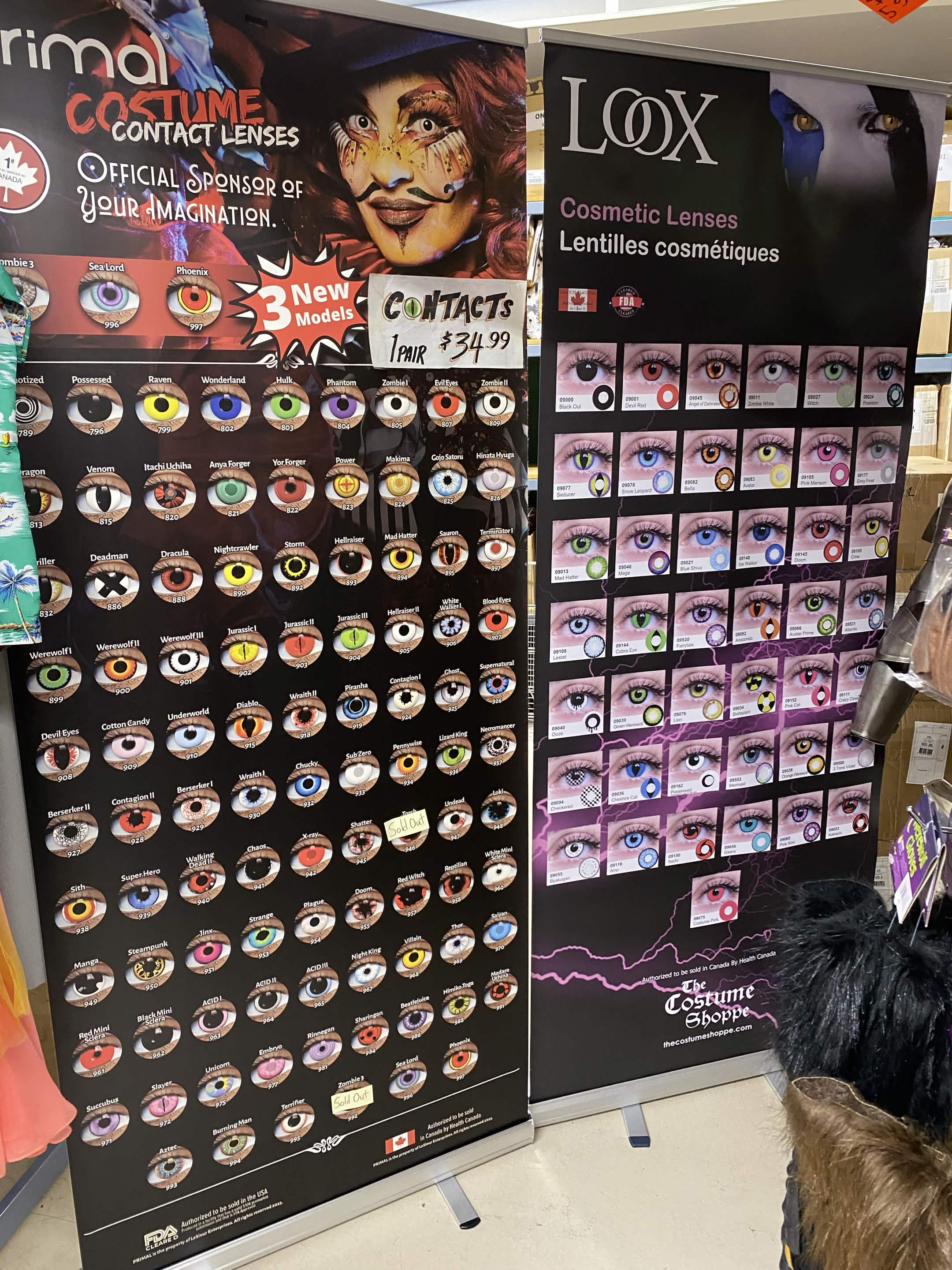 Primal and Loox costume contact lens displays with over 130 styles at The Costume Shoppe in Calgary